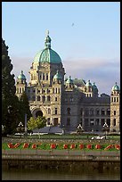 Legistlative buildings and Victoria written in flowers, morning. Victoria, British Columbia, Canada (color)