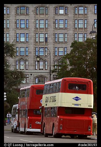 Double-deck tour busses. Victoria, British Columbia, Canada (color)