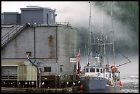 Commercial fishing boat next to a fishery, Tofino. Vancouver Island, British Columbia, Canada