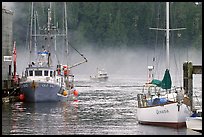 Yacht and fishing boat, Tofino. Vancouver Island, British Columbia, Canada (color)