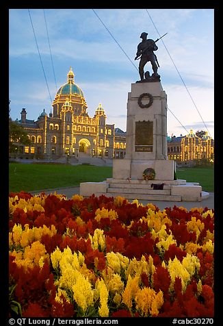 Flowers, memorial, and illuminated parliament. Victoria, British Columbia, Canada (color)