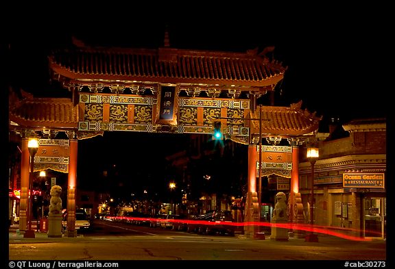 Gate of Harmonious Interest marking the entrance of Chinatown, night. Victoria, British Columbia, Canada