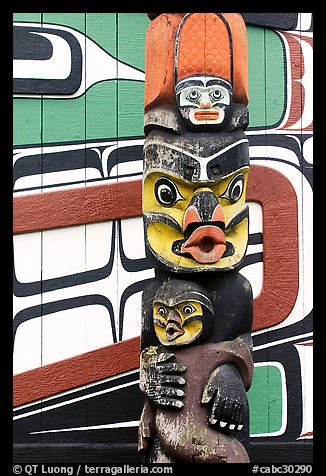 Totem pole and wall of Carving studio. Victoria, British Columbia, Canada (color)