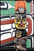 Totem pole and wall of Carving studio. Victoria, British Columbia, Canada (color)