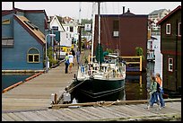 Houseboats, deck, and sailboat, Upper Harbour. Victoria, British Columbia, Canada ( color)