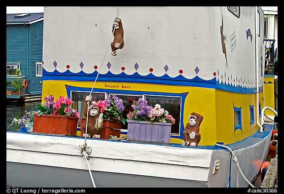 Houseboat decorated with a monkey theme. Victoria, British Columbia, Canada (color)