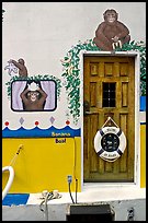 Door of houseboat decorated with a monkey theme. Victoria, British Columbia, Canada (color)