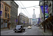 Street in Gastown with two old cars. Vancouver, British Columbia, Canada