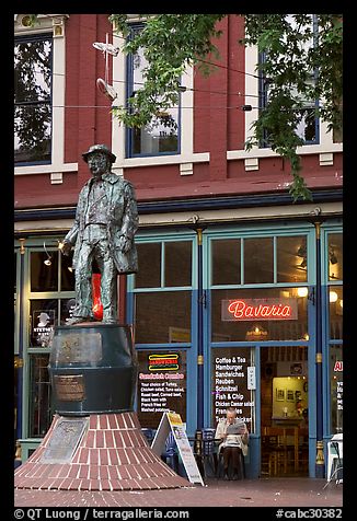 Statue and cafe in Gastown. Vancouver, British Columbia, Canada (color)