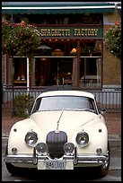 Classic car in front of Spaghetti Factory restaurant. Vancouver, British Columbia, Canada