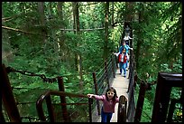 Kid on treetop trail. Vancouver, British Columbia, Canada