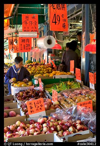 Fruit store in Chinatown. Some of the tropical fruit cannot be imported to the US. Vancouver, British Columbia, Canada (color)