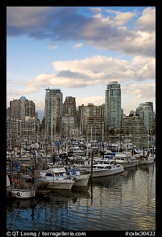 Skyline and boats seen from Fishermans harbor, late afternoon. Vancouver, British Columbia, Canada (color)
