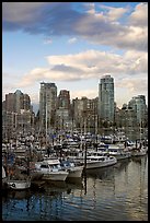 Skyline and boats seen from Fishermans harbor, late afternoon. Vancouver, British Columbia, Canada