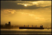 Cargo ship in harbor a sunrise. Vancouver, British Columbia, Canada