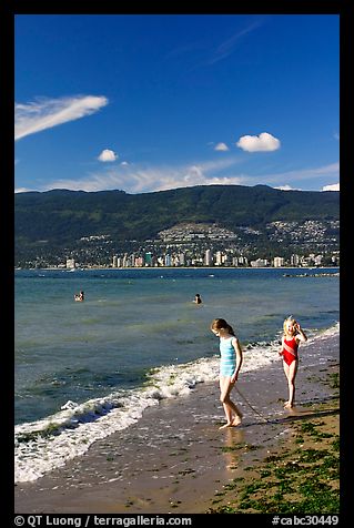 Girls on a beach, Stanley Park. Vancouver, British Columbia, Canada (color)