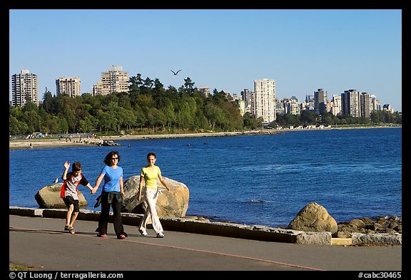 Family walking around Stanley Park. Vancouver, British Columbia, Canada