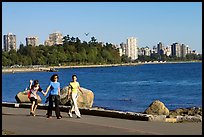 Family walking around Stanley Park. Vancouver, British Columbia, Canada