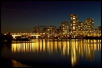 Skyline seen across False Creek at night. Vancouver, British Columbia, Canada