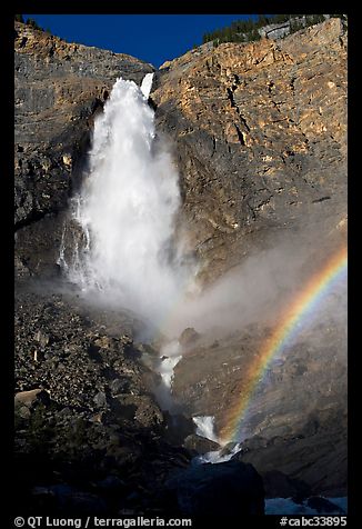 Takkakaw Falls, mist, and rainbow, late afternoon. Yoho National Park, Canadian Rockies, British Columbia, Canada