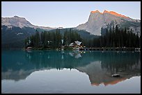 Cabins on the shore of Emerald Lake, with reflected mountains, sunset. Yoho National Park, Canadian Rockies, British Columbia, Canada (color)