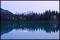 Trees and cabins reflected in Emerald Lake, dusk. Yoho National Park, Canadian Rockies, British Columbia, Canada ( color)