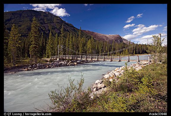 Suspension bridge spanning the Vermillion River. Kootenay National Park, Canadian Rockies, British Columbia, Canada (color)