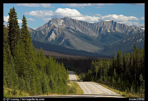 Kootenay Parkway highway and mountains, afternoon. Kootenay National Park, Canadian Rockies, British Columbia, Canada (color)