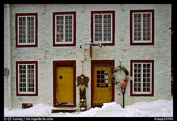 Facade in winter with snow on the curb,  Quebec City. Quebec, Canada