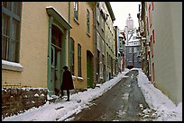 Narrow street partly covered with snow, Quebec City. Quebec, Canada (color)