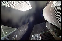 Looking up from plaza with Bank of China and Cheung Kong Center buildings by night. Hong-Kong, China (color)