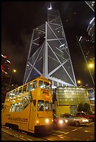 Old tram and Bank of China building (369m), designed by Pei, by night. Hong-Kong, China (color)