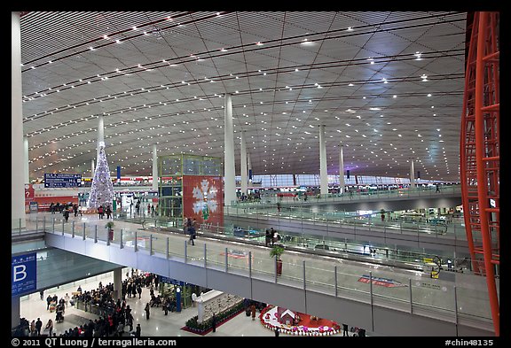 Inside main concourse at dusk, Beijing Capital International Airport. Beijing, China (color)