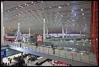 Inside main concourse at dusk, Beijing Capital International Airport. Beijing, China (color)