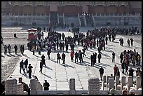 Crowd of tourists in the Sea of Flagstone (court of the imperial palace), Forbidden City. Beijing, China