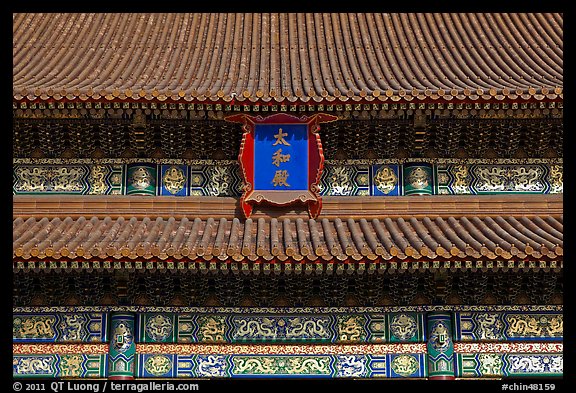 Roof detail and sign on Hall of Supreme Harmony, Forbidden City. Beijing, China