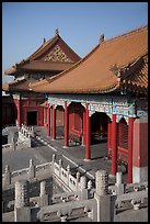 Pavilion with red columns and yellow roof tiles typical of imperial architecture, Forbidden City. Beijing, China (color)
