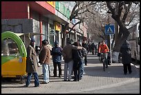 People on sidewalk. Beijing, China ( color)