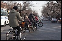 Bicyles and cyclo on street. Beijing, China (color)