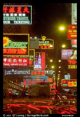 Nathan road, brilliantly lit by neon lights at night, Kowloon. Hong-Kong, China