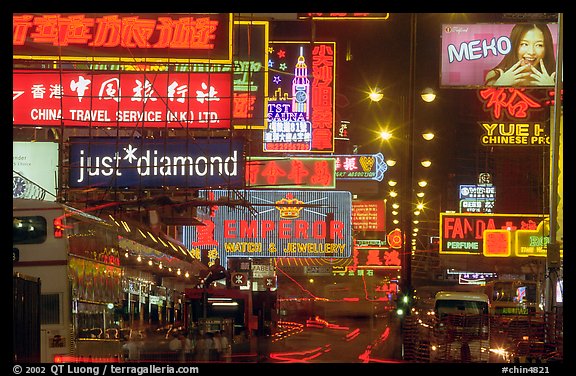 Nathan road, bustling with animation  at night, Kowloon. Hong-Kong, China