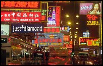 Nathan road, bustling with animation  at night, Kowloon. Hong-Kong, China