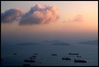 Cargo ships anchored outside of the harbor. Hong-Kong, China