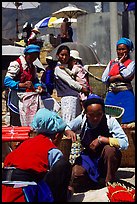 Bai tribeswomen selling incense. Shaping, Yunnan, China (color)