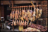 Ham made with cattle legs, salted when raw, and dried under the sun. Kunming, Yunnan, China (color)