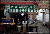 Muslim cooks at restaurant storefront. Kunming, Yunnan, China ( color)