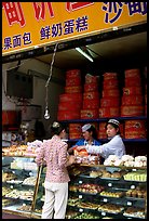 Women at Muslim pastry store. Kunming, Yunnan, China (color)