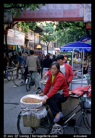 Street vendor in an old alley. Kunming, Yunnan, China