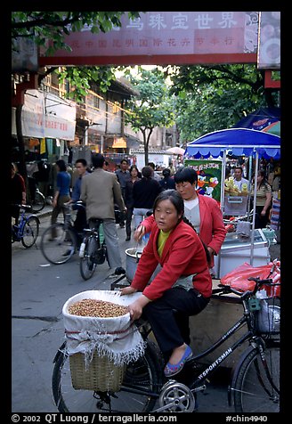 Street vendor in an old alley. Kunming, Yunnan, China (color)