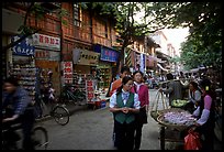 Street vendors in an old street. Kunming, Yunnan, China